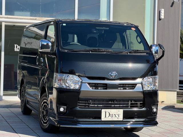 ハイエースバン ロングスーパーＧＬ　ダークプライムＳ　モデリスタエアロ（Ｆ／Ｓ／Ｒ）　社外１５インチＡＷ　パノラミックビューモニター　デジタルインナーミラー　寒冷地仕様　スカッフプレート　両側パワースライドドア　黒ハーフレザーシート　ＬＥＤヘッドライト（5枚目）