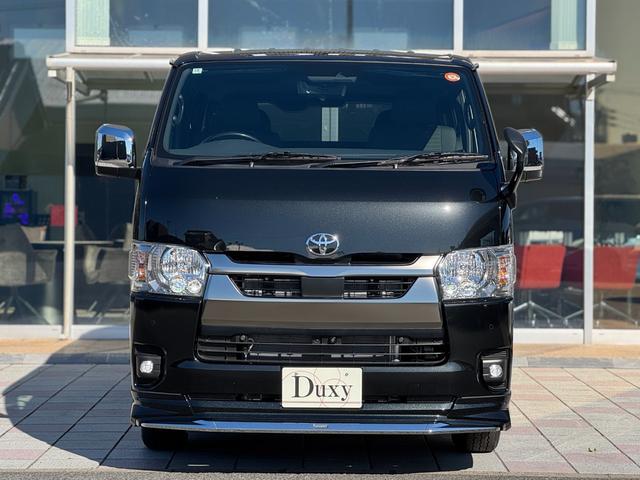ハイエースバン ロングスーパーＧＬ　ダークプライムＳ　モデリスタエアロ（Ｆ／Ｓ／Ｒ）　社外１５インチＡＷ　パノラミックビューモニター　デジタルインナーミラー　寒冷地仕様　スカッフプレート　両側パワースライドドア　黒ハーフレザーシート　ＬＥＤヘッドライト（13枚目）
