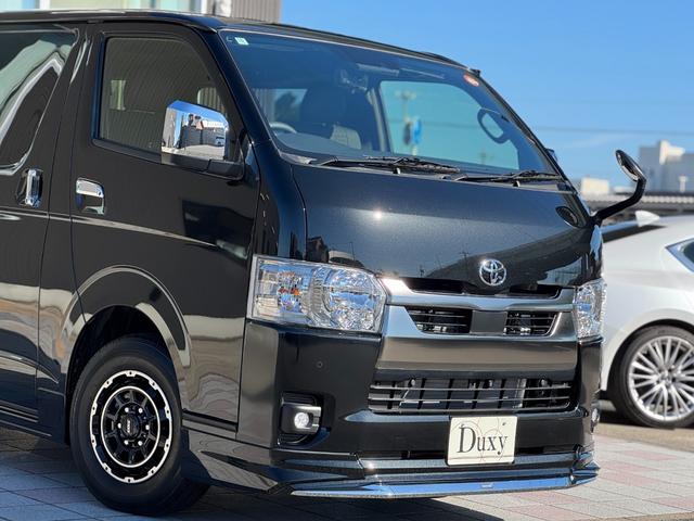 ハイエースバン ロングスーパーＧＬ　ダークプライムＳ　モデリスタエアロ（Ｆ／Ｓ／Ｒ）　社外１５インチＡＷ　パノラミックビューモニター　デジタルインナーミラー　寒冷地仕様　スカッフプレート　両側パワースライドドア　黒ハーフレザーシート　ＬＥＤヘッドライト（15枚目）