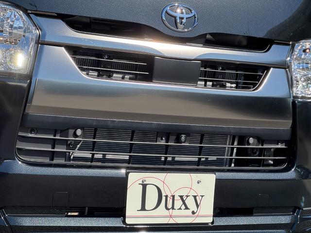 ハイエースバン ロングスーパーＧＬ　ダークプライムＳ　モデリスタエアロ（Ｆ／Ｓ／Ｒ）　社外１５インチＡＷ　パノラミックビューモニター　デジタルインナーミラー　寒冷地仕様　スカッフプレート　両側パワースライドドア　黒ハーフレザーシート　ＬＥＤヘッドライト（17枚目）