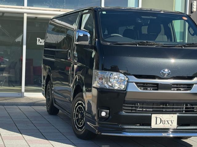 ハイエースバン ロングスーパーＧＬ　ダークプライムＳ　モデリスタエアロ（Ｆ／Ｓ／Ｒ）　社外１５インチＡＷ　パノラミックビューモニター　デジタルインナーミラー　寒冷地仕様　スカッフプレート　両側パワースライドドア　黒ハーフレザーシート　ＬＥＤヘッドライト（22枚目）