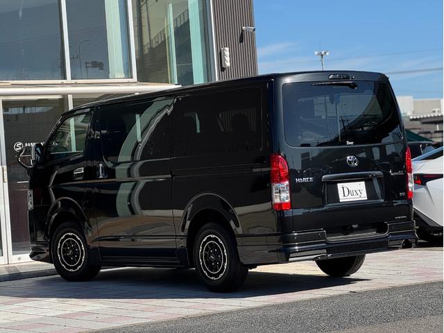 ハイエースバン ロングスーパーＧＬ　ダークプライムＳ　モデリスタエアロ（Ｆ／Ｓ／Ｒ）　社外１５インチＡＷ　パノラミックビューモニター　デジタルインナーミラー　寒冷地仕様　スカッフプレート　両側パワースライドドア　黒ハーフレザーシート　ＬＥＤヘッドライト（34枚目）