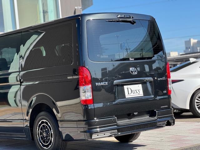 ハイエースバン ロングスーパーＧＬ　ダークプライムＳ　モデリスタエアロ（Ｆ／Ｓ／Ｒ）　社外１５インチＡＷ　パノラミックビューモニター　デジタルインナーミラー　寒冷地仕様　スカッフプレート　両側パワースライドドア　黒ハーフレザーシート　ＬＥＤヘッドライト（36枚目）