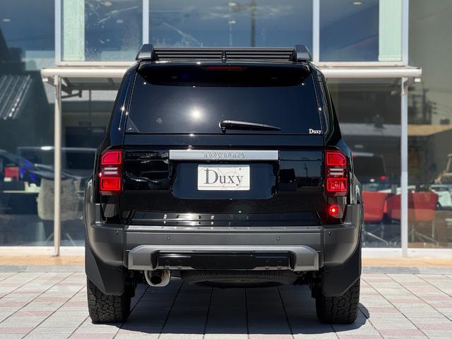 ランドクルーザー２５０ ＶＸ　丸目ＬＬＥＤヘッドライト　モデリスタパッケージ　シグネチャーイルミ　オーバーフェンダー　２０インチＡＷ　ルーフラック　デジタルインナーミラー　ムーンルーフ　パノラマビュー　ブラインドスポットモニター（37枚目）