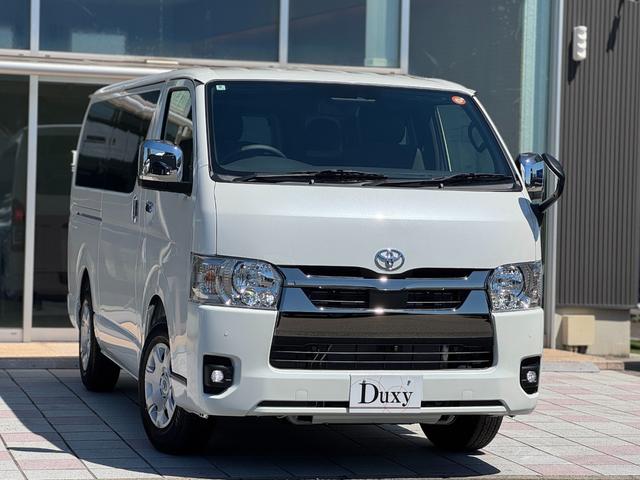 ハイエースバン ロングスーパーGL ダークプライムS パノラミックビューモニター デジタルインナーミラー 両側パワースライドドア LEDヘッド・フォグライト 黒ハーフレザーシート 純正15インチスチールホイール アクセサリーコンセント スマートキー(5枚目)