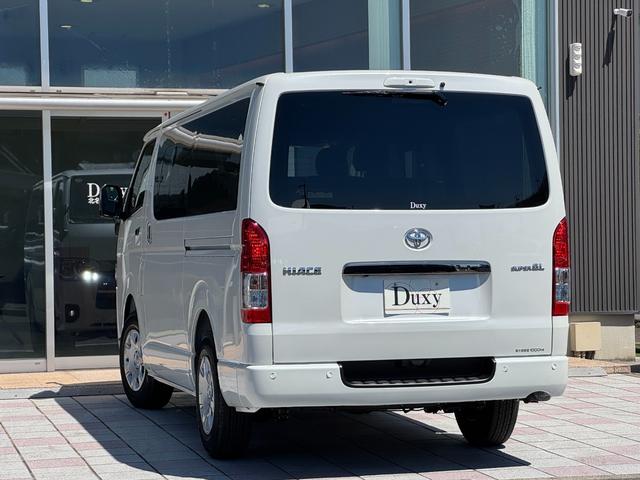 ハイエースバン ロングスーパーGL ダークプライムS パノラミックビューモニター デジタルインナーミラー 両側パワースライドドア LEDヘッド・フォグライト 黒ハーフレザーシート 純正15インチスチールホイール アクセサリーコンセント スマートキー(7枚目)