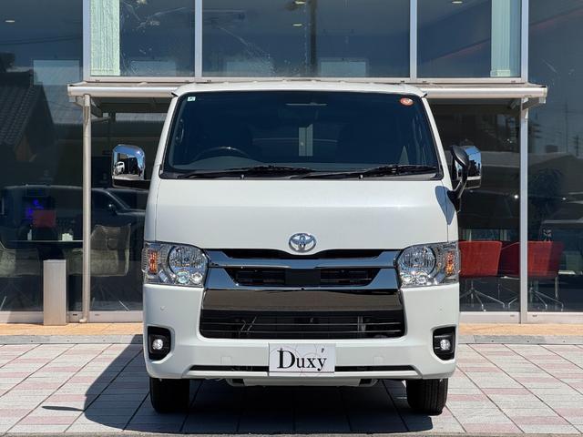 ハイエースバン ロングスーパーGL ダークプライムS パノラミックビューモニター デジタルインナーミラー 両側パワースライドドア LEDヘッド・フォグライト 黒ハーフレザーシート 純正15インチスチールホイール アクセサリーコンセント スマートキー(12枚目)
