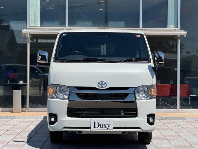 ハイエースバン ロングスーパーGL ダークプライムS パノラミックビューモニター デジタルインナーミラー 両側パワースライドドア LEDヘッド・フォグライト 黒ハーフレザーシート 純正15インチスチールホイール アクセサリーコンセント スマートキー(13枚目)