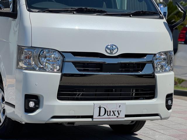 ハイエースバン ロングスーパーGL ダークプライムS パノラミックビューモニター デジタルインナーミラー 両側パワースライドドア LEDヘッド・フォグライト 黒ハーフレザーシート 純正15インチスチールホイール アクセサリーコンセント スマートキー(16枚目)