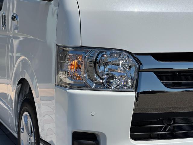 ハイエースバン ロングスーパーGL ダークプライムS パノラミックビューモニター デジタルインナーミラー 両側パワースライドドア LEDヘッド・フォグライト 黒ハーフレザーシート 純正15インチスチールホイール アクセサリーコンセント スマートキー(21枚目)