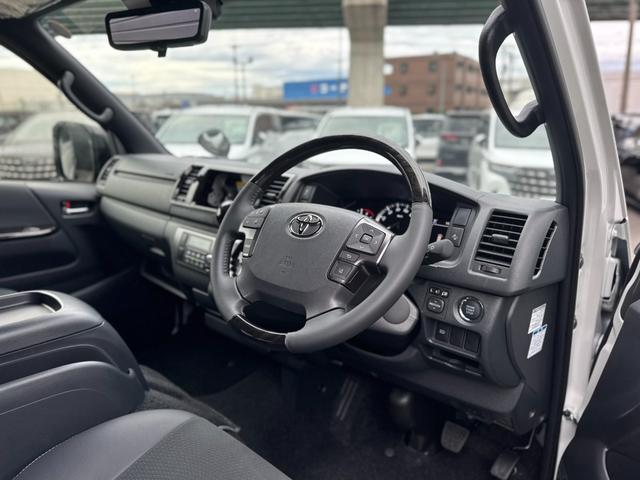 ハイエースバン ロングスーパーGL ダークプライムS パノラミックビューモニター デジタルインナーミラー 両側パワースライドドア LEDヘッド・フォグライト 黒ハーフレザーシート 純正15インチスチールホイール アクセサリーコンセント スマートキー(42枚目)