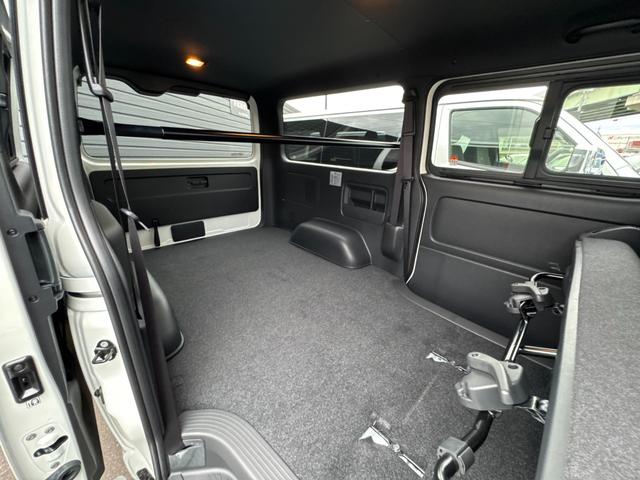 ハイエースバン ロングスーパーGL ダークプライムS パノラミックビューモニター デジタルインナーミラー 両側パワースライドドア LEDヘッド・フォグライト 黒ハーフレザーシート 純正15インチスチールホイール アクセサリーコンセント スマートキー(73枚目)