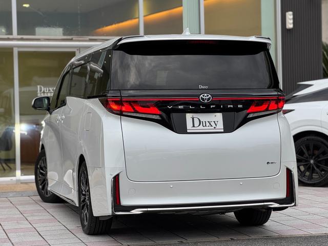 ヴェルファイアハイブリッド Ｚ　プレミア　１３．２型有機ＥＬ後席モニター　デジタルインナーミラー　左右独立ムーンルーフ　トヨタチームメイトアドバンストパーク　カラーヘッドアップディスプレイ　パノラミックビューモニター　ブラインドスポットモニタ（7枚目）