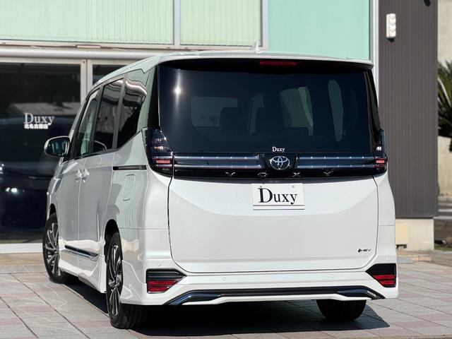 ヴォクシー ハイブリッドＳ－Ｚ　１３．２型有機ＥＬ後席モニター　モデリスタエアロ（Ｆ／Ｓ／Ｒ）　快適利便パッケージｈｉｇｈ　ユニバーサルステップ　トヨタチームメイト　ヘッドアップディスプレイ　３眼ＬＥＤヘッドライト　デジタルミラー（7枚目）