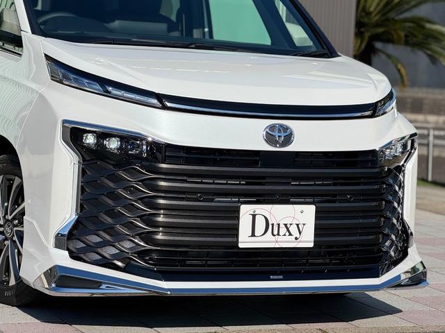 ヴォクシー ハイブリッドＳ－Ｚ　１３．２型有機ＥＬ後席モニター　モデリスタエアロ（Ｆ／Ｓ／Ｒ）　快適利便パッケージｈｉｇｈ　ユニバーサルステップ　トヨタチームメイト　ヘッドアップディスプレイ　３眼ＬＥＤヘッドライト　デジタルミラー（13枚目）