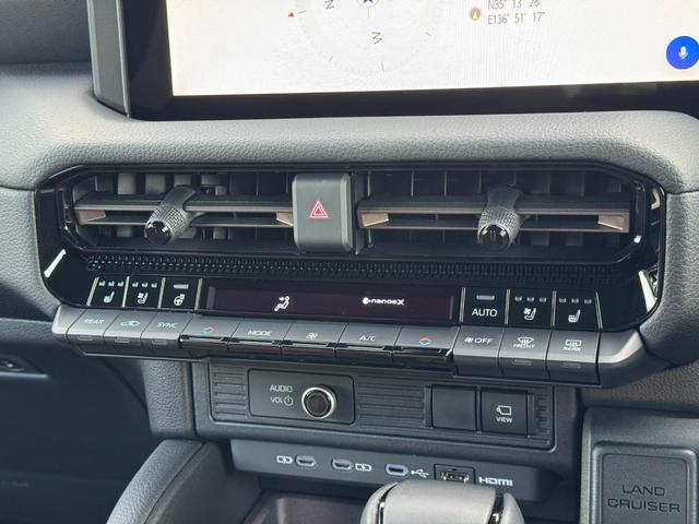 ランドクルーザー２５０ ＶＸファーストエディション　モデリスタパッケージ　シグネチャーイルミ　丸目ＬＥＤヘッドライト　トヨタチームメイト　デジタルミラー　ムーンルーフ　パノラミックビューモニター　ブラインドスポットモニター　１３．２インチディスプレイ（62枚目）