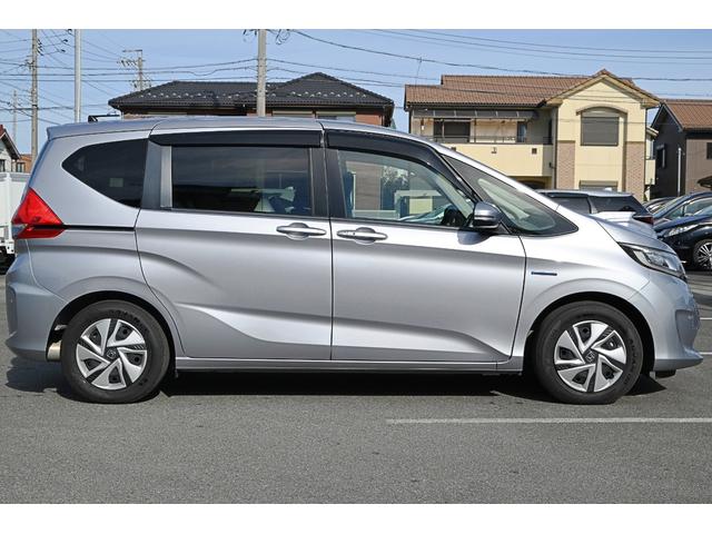 フリードハイブリッド ハイブリッド・Gホンダセンシング 両側パワースライドドア レーダークルーズ LEDヘッドライト スマートキー プッシュスタート ステアリングスイッチ 純正ナビ バックモニター(2枚目)