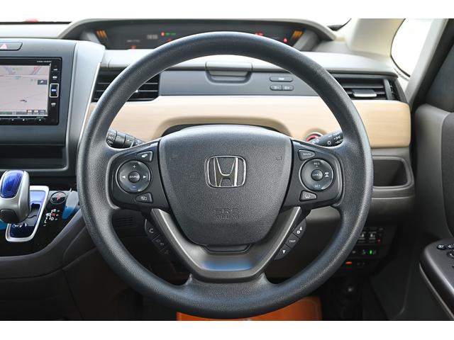 フリードハイブリッド ハイブリッド・Gホンダセンシング 両側パワースライドドア レーダークルーズ LEDヘッドライト スマートキー プッシュスタート ステアリングスイッチ 純正ナビ バックモニター(9枚目)