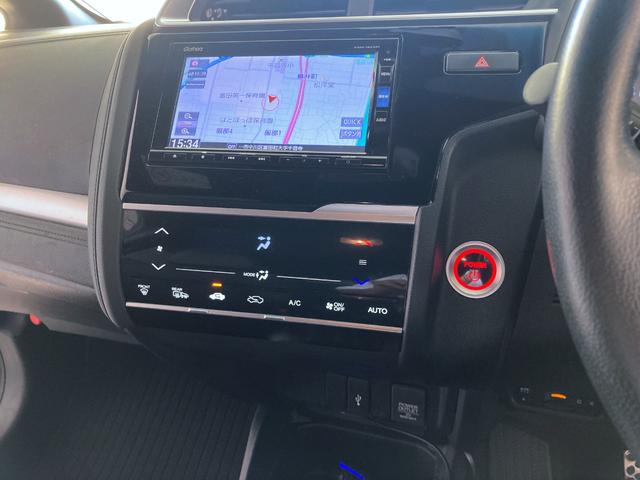 フィットハイブリッド ハイブリッド・モデューロスタイル ホンダセンシング レーダークルーズ LEDヘッド・フォグライト スマートキー プッシュスタート ステアリングスイッチ オートリトラミラー 純正ナビ バックモニター(18枚目)