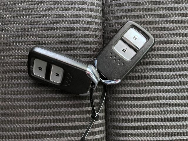 フィットハイブリッド ハイブリッド・モデューロスタイル ホンダセンシング レーダークルーズ LEDヘッド・フォグライト スマートキー プッシュスタート ステアリングスイッチ オートリトラミラー 純正ナビ バックモニター(22枚目)