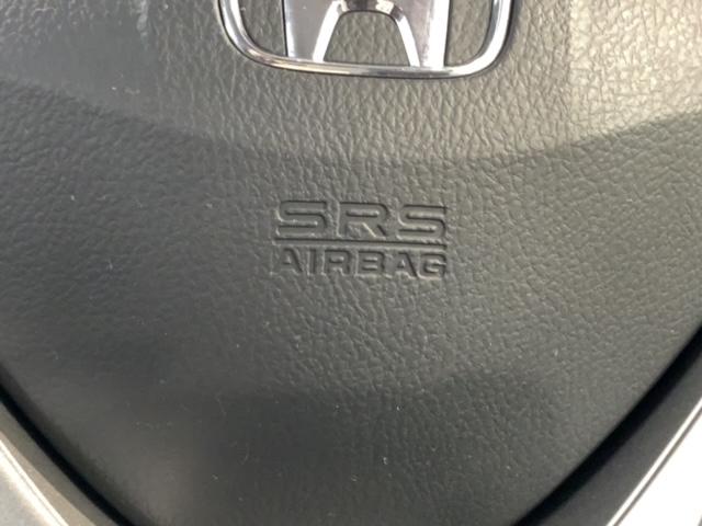 フリードハイブリッド ジャストセレクション 1年保証ナビTVRカメラCD録音 ナビテレビ セキュリティー 横滑り防止機能 記録簿 オートクルーズ 地デジ エアバック DVD再生可能 キーレスエントリー PS ETC フルオートエアコン ABS(22枚目)