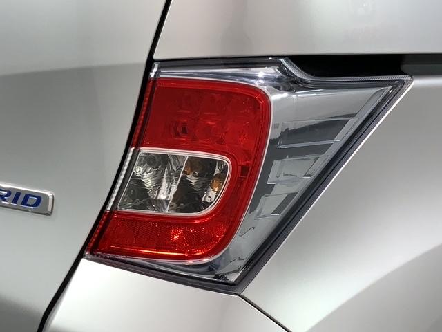 フリードハイブリッド ジャストセレクション 1年保証ナビTVRカメラCD録音 ナビテレビ セキュリティー 横滑り防止機能 記録簿 オートクルーズ 地デジ エアバック DVD再生可能 キーレスエントリー PS ETC フルオートエアコン ABS(45枚目)