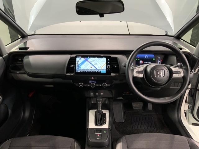 フィット e:HEVクロスター HSENSING2ト-ン新車保証試乗車 メモリナビ 衝突回避システム 禁煙 1オーナー アルミ フルオートエアコン 整備記録簿 LEDランプ エアバッグ サイドエアバック 地デジ VSA ETC(9枚目)