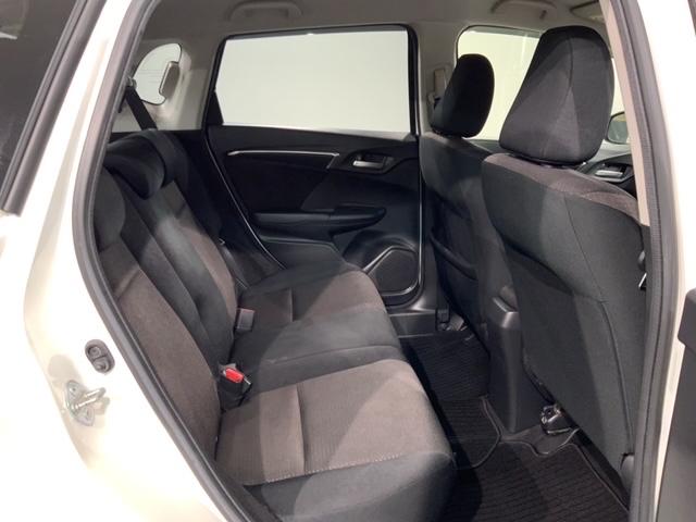 フィットハイブリッド Ｆパッケージ　１年保証　ナビＶＸＭ－１４５ＶＳｉ　ＴＶ　Ｒカメラ　ＤＶＤ　ドラレコ　ＥＴＣ　スマ－トキ－　盗難防止装置　ドアバイザ－　ＡＡＣ　Ｗエアバッグ　盗難警報装置　ＡＵＴＯエアコン　Ｄレコ　助手席エアバック（19枚目）