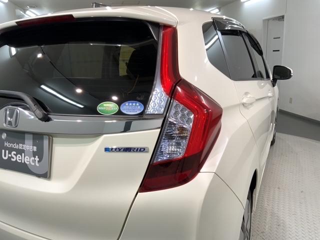 フィットハイブリッド Ｆパッケージ　１年保証　ナビＶＸＭ－１４５ＶＳｉ　ＴＶ　Ｒカメラ　ＤＶＤ　ドラレコ　ＥＴＣ　スマ－トキ－　盗難防止装置　ドアバイザ－　ＡＡＣ　Ｗエアバッグ　盗難警報装置　ＡＵＴＯエアコン　Ｄレコ　助手席エアバック（45枚目）