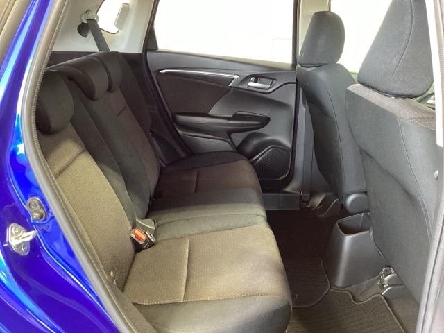 フィットハイブリッド Ｆパッケージ　福祉車両１年保証ワンオ－ナ－ナビ　地デジＴＶ　盗難警報装置　ワンオ－ナ－車　記録簿有り　ＡＵＴＯエアコン　助手席エアバック　ＥＴＣ付き　リヤカメラ　ＡＢＳ付　ＤＶＤ視聴　横滑り防止システム　ナビテレビ（17枚目）