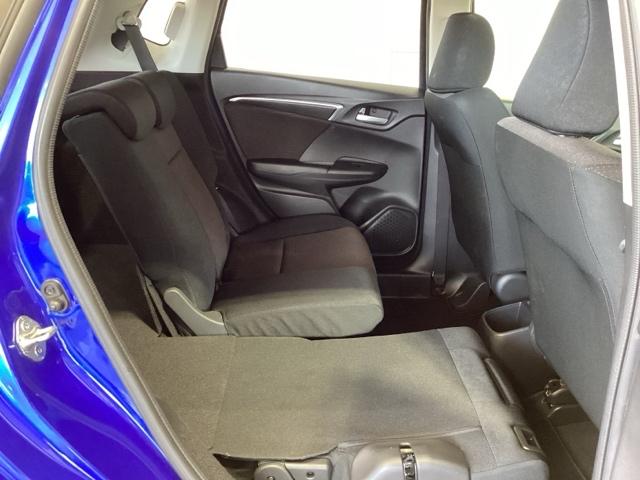 フィットハイブリッド Ｆパッケージ　福祉車両１年保証ワンオ－ナ－ナビ　地デジＴＶ　盗難警報装置　ワンオ－ナ－車　記録簿有り　ＡＵＴＯエアコン　助手席エアバック　ＥＴＣ付き　リヤカメラ　ＡＢＳ付　ＤＶＤ視聴　横滑り防止システム　ナビテレビ（26枚目）