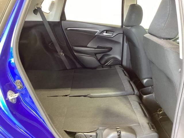 フィットハイブリッド Ｆパッケージ　福祉車両１年保証ワンオ－ナ－ナビ　地デジＴＶ　盗難警報装置　ワンオ－ナ－車　記録簿有り　ＡＵＴＯエアコン　助手席エアバック　ＥＴＣ付き　リヤカメラ　ＡＢＳ付　ＤＶＤ視聴　横滑り防止システム　ナビテレビ（27枚目）