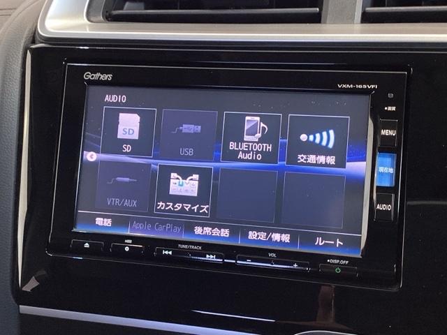 フィットハイブリッド Ｆパッケージ　福祉車両１年保証ワンオ－ナ－ナビ　地デジＴＶ　盗難警報装置　ワンオ－ナ－車　記録簿有り　ＡＵＴＯエアコン　助手席エアバック　ＥＴＣ付き　リヤカメラ　ＡＢＳ付　ＤＶＤ視聴　横滑り防止システム　ナビテレビ（32枚目）