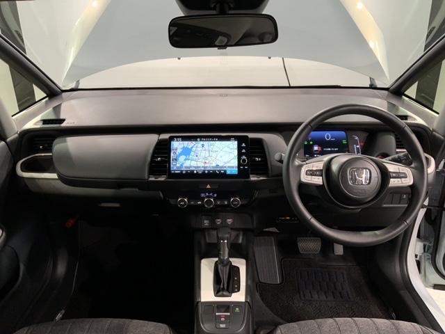 フィット e:HEVホーム H SENSING 新車保証 試乗車 ワンオーナー 純正ナビ TV Rカメラ BTオ-ディオ ETC LEDライト VSA クルコン スマートキー 盗難防止装置 整備記録簿 AAC Wエアバッグ(9枚目)