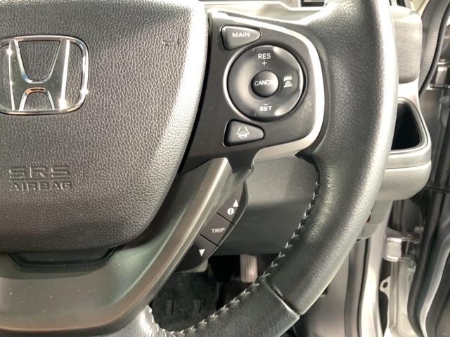 フリード Ｇ・ホンダセンシング　１年保証　ワンオーナー　ナビＶＸＭ－１７４ＶＦｉ　ＴＶ　Ｒカメラ　ＢＴオ－ディオ　ＤＶＤ　ＥＴＣ　ＬＥＤライト　ＶＳＡ　両側電動ドア　クルコン　アルミ　スマートキー　盗難防止装置　整備記録簿　ＡＡＣ（11枚目）