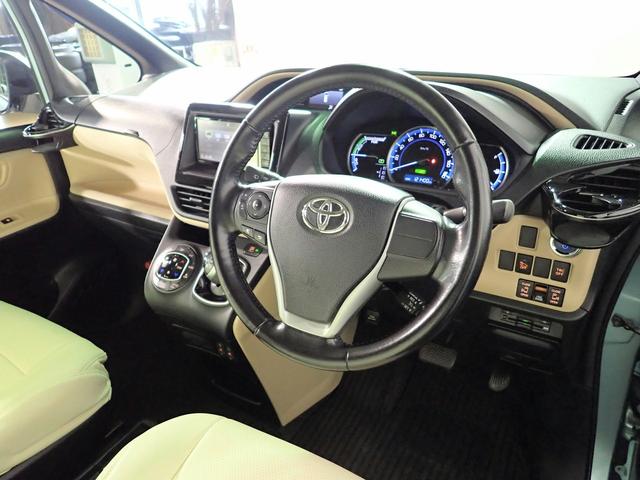 ノア ハイブリッドG 外ナビ/バックカメラ/フルセグTV/ブルートゥース/CD・DVD/音楽録音/フリップダウンモニター/ETC/インテリキー/HIDオートライト/シートヒーター/両側パワスラ/革調シートカバー/純15AW(19枚目)