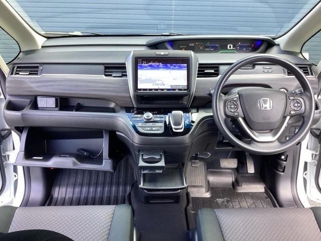 フリードハイブリッド ハイブリッド・Ｇブラックスタイル　ホンダ純正９インチインターナビ　Ｂｌｕｅｔｏｏｔｈ　地デジ　ＤＶＤビデオ　バックカメラ　ＬＥＤヘッドライト　両側電動スライドドア　スマートキー　ドライブレコーダー　ホンダセンシング　アルミホイール（10枚目）