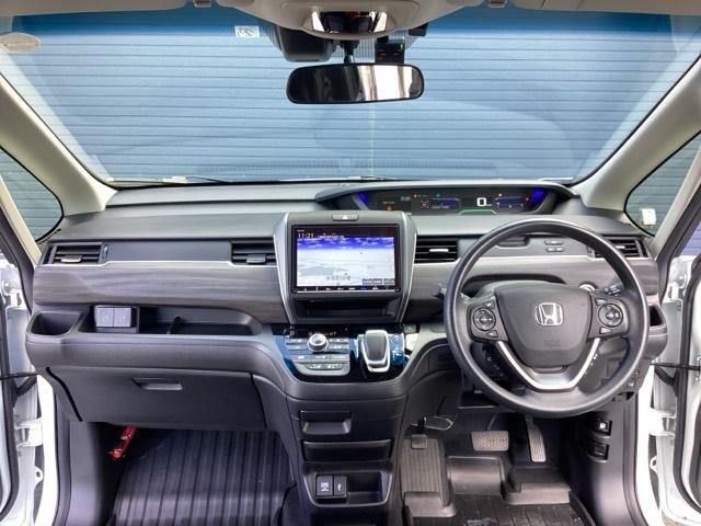 フリードハイブリッド ハイブリッド・Ｇブラックスタイル　ホンダ純正９インチインターナビ　Ｂｌｕｅｔｏｏｔｈ　地デジ　ＤＶＤビデオ　バックカメラ　ＬＥＤヘッドライト　両側電動スライドドア　スマートキー　ドライブレコーダー　ホンダセンシング　アルミホイール（20枚目）
