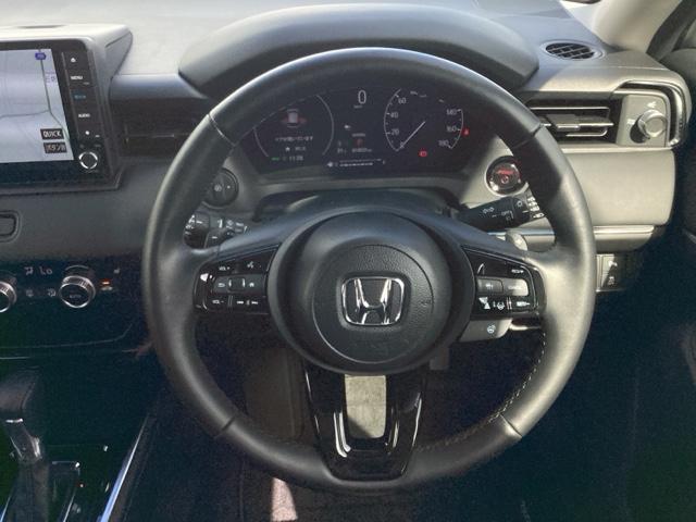 ヴェゼル ｅ：ＨＥＶＺ　２年間　走行距離無制限　保証付　当社デモカー　禁煙車　ワンオーナー　９インチインターナビ　フルセグＴＶ　ＢＴＡ　ＤＶＤ　ＥＴＣ　Ｂカメラ　シートヒーター　電動テールゲート　アルミホイール　ＬＥＤライト（16枚目）