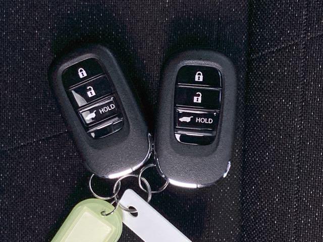 ヴェゼル ｅ：ＨＥＶＺ　２年間　走行距離無制限　保証付　当社デモカー　禁煙車　ワンオーナー　９インチインターナビ　フルセグＴＶ　ＢＴＡ　ＤＶＤ　ＥＴＣ　Ｂカメラ　シートヒーター　電動テールゲート　アルミホイール　ＬＥＤライト（21枚目）