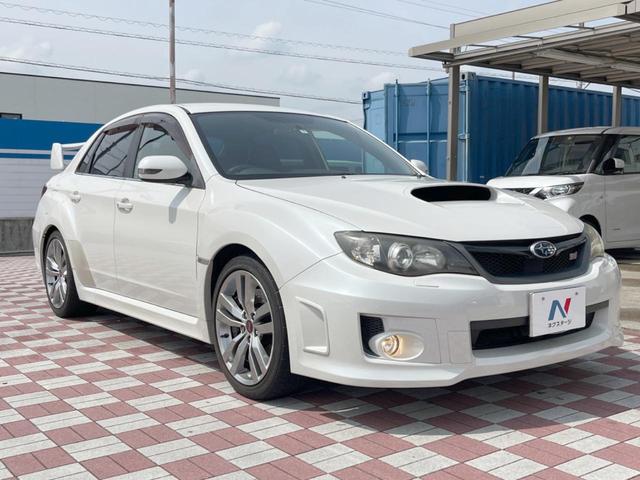 インプレッサ ＷＲＸ　ＳＴｉ　禁煙車　大型リアスポイラー　パワーシート　カロッツェリアナビ　バックカメラ　ハーフレザー　パワーシート　純正１８インチアルミ　オートエアコン　Ｓ－Ｉドライブ　ＨＩＤヘッド　６ＭＴ　ＥＴＣ（16枚目）