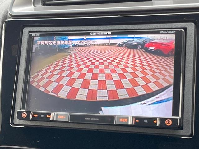 フィット RS ホンダセンシング 禁煙車 6速MT パイオニア製SDナビ バックカメラ スマートキー ETC ハーフレザー 純正16インチアルミ LEDヘッドライト 純正革巻きステアリング ホンダセンシング クルコン オートエアコン(4枚目)