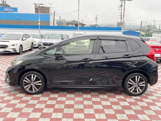 フィット RS ホンダセンシング 禁煙車 6速MT パイオニア製SDナビ バックカメラ スマートキー ETC ハーフレザー 純正16インチアルミ LEDヘッドライト 純正革巻きステアリング ホンダセンシング クルコン オートエアコン(28枚目)