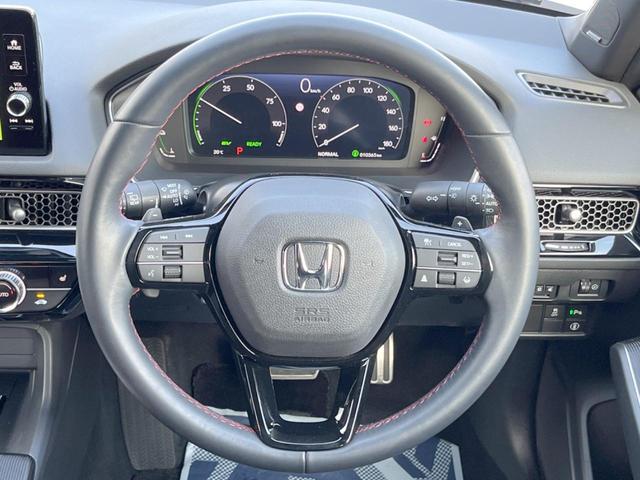 シビック ｅ：ＨＥＶ　禁煙車　９型ホンダコネクトナビ　ＢＯＳＥサウンド　バックカメラ　ホンダセンシング　ＥＴＣ　ハーフレザー　ＬＥＤヘッド　純正１８インチアルミ　シートヒーター　パワーシート　スマートキー　レーダークルーズ（11枚目）