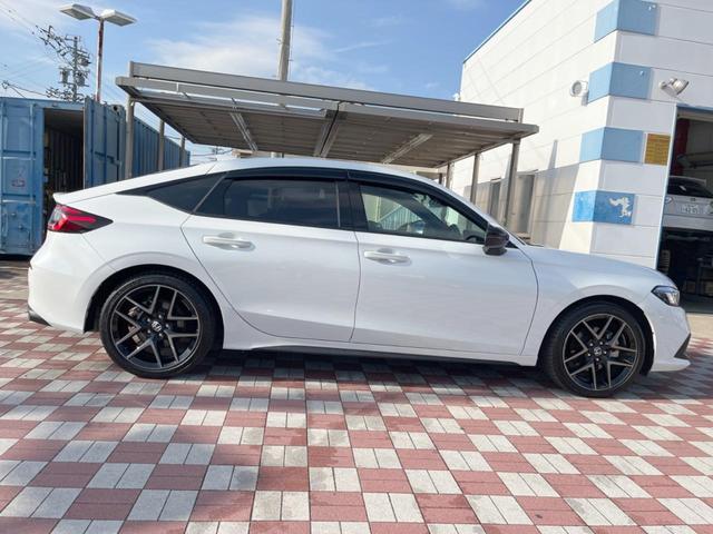 シビック ｅ：ＨＥＶ　禁煙車　９型ホンダコネクトナビ　ＢＯＳＥサウンド　バックカメラ　ホンダセンシング　ＥＴＣ　ハーフレザー　ＬＥＤヘッド　純正１８インチアルミ　シートヒーター　パワーシート　スマートキー　レーダークルーズ（28枚目）