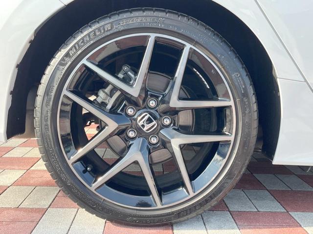 シビック ｅ：ＨＥＶ　禁煙車　９型ホンダコネクトナビ　ＢＯＳＥサウンド　バックカメラ　ホンダセンシング　ＥＴＣ　ハーフレザー　ＬＥＤヘッド　純正１８インチアルミ　シートヒーター　パワーシート　スマートキー　レーダークルーズ（31枚目）