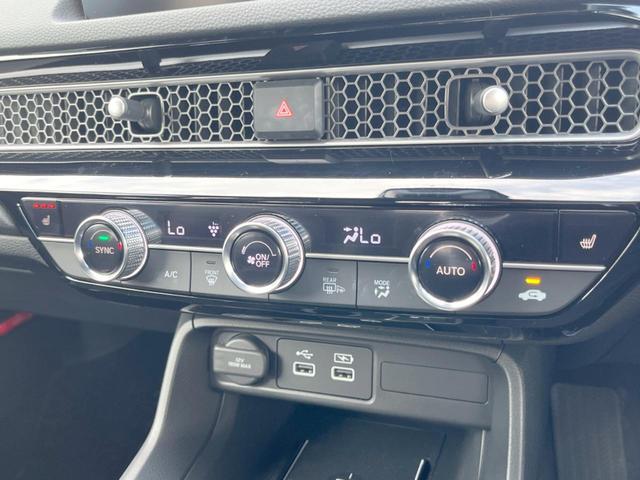 シビック ｅ：ＨＥＶ　禁煙車　９型ホンダコネクトナビ　ＢＯＳＥサウンド　バックカメラ　ホンダセンシング　ＥＴＣ　ハーフレザー　ＬＥＤヘッド　純正１８インチアルミ　シートヒーター　パワーシート　スマートキー　レーダークルーズ（36枚目）