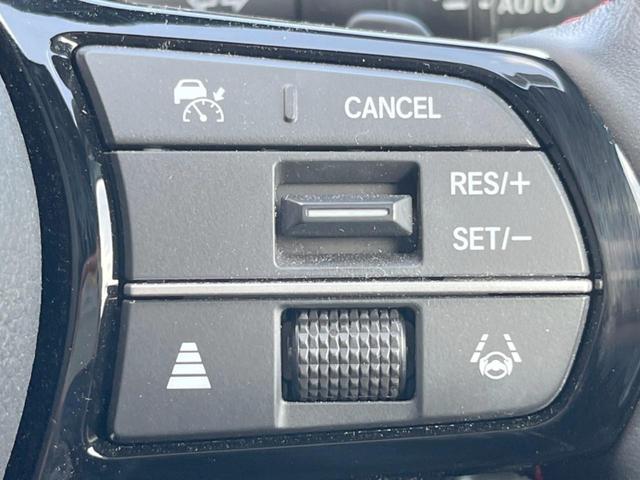 シビック ｅ：ＨＥＶ　禁煙車　９型ホンダコネクトナビ　ＢＯＳＥサウンド　バックカメラ　ホンダセンシング　ＥＴＣ　ハーフレザー　ＬＥＤヘッド　純正１８インチアルミ　シートヒーター　パワーシート　スマートキー　レーダークルーズ（48枚目）