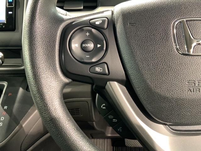 フリード G・ホンダセンシング 1年保証 ワンオ-ナ- ナビVXM-184VFi TV RカメラBTオ-ディオ DVD ETC LEDライト 両側電動ドア VSA クルコン スマ-トキ- 盗難防止装置 整備記録簿 AAC スペアキ-(10枚目)