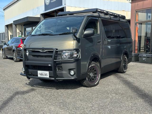 ハイエースバン ロングDX GLパッケージ 9人乗り 4WD ディーゼル リアクーラー&ヒーター ブロンズメタリック&マットブラック塗装 ベッドキット 社外タイヤ/アルミ/バンパーガード/キャリア/ラダー/テールガード/LEDヘッドライト(5枚目)